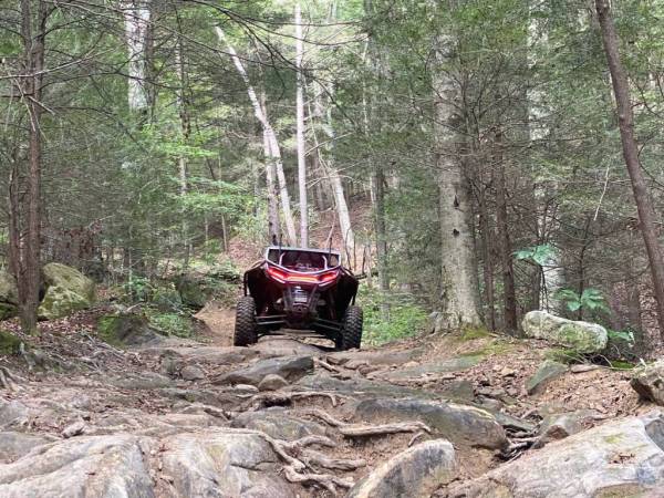 Customer side by side on the trail