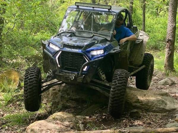 Customer side by side on the trail